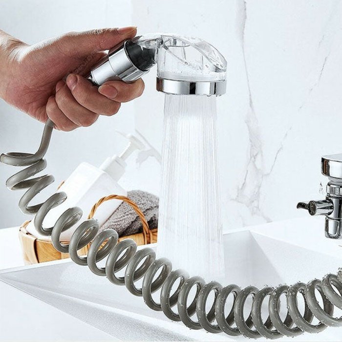 Faucet extension with shower handle